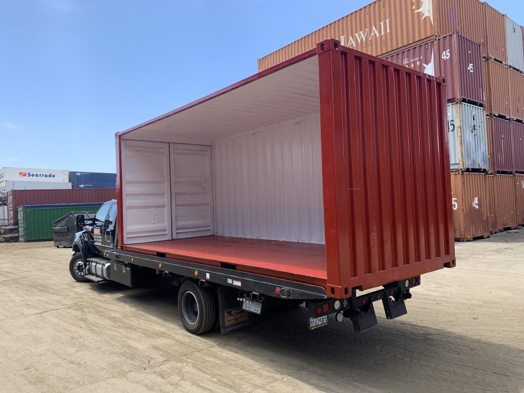 Container with an open side modification on a delivery truck