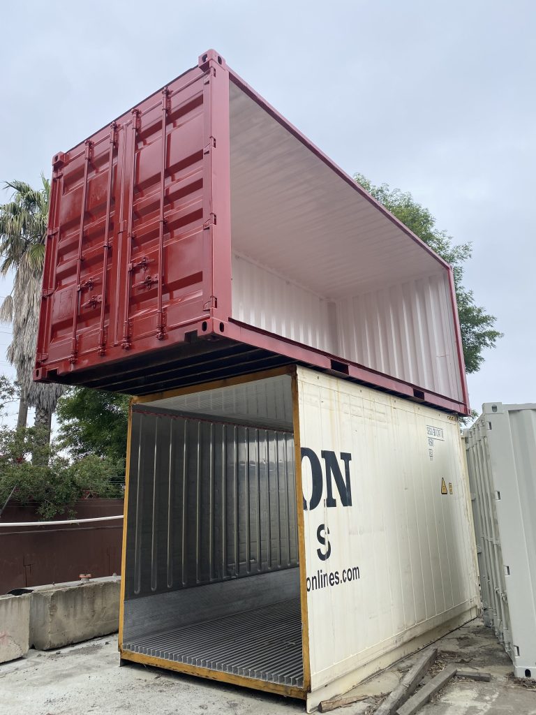 Custom open side container stacked on another unit