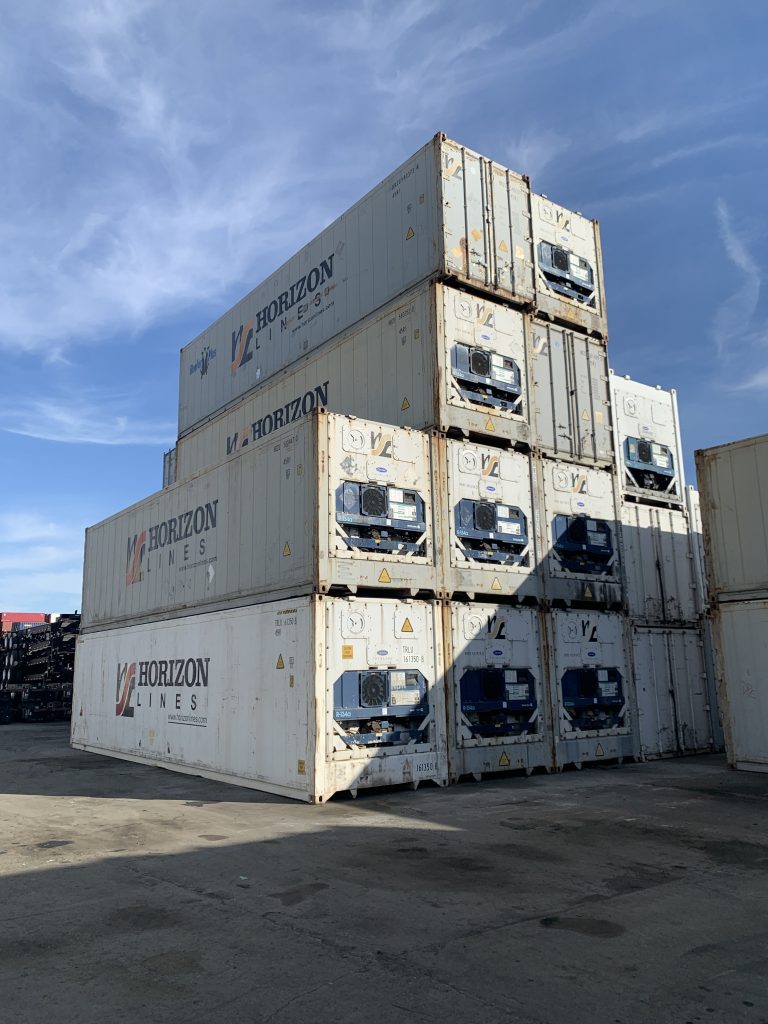 Stacked refrigerated shipping containers